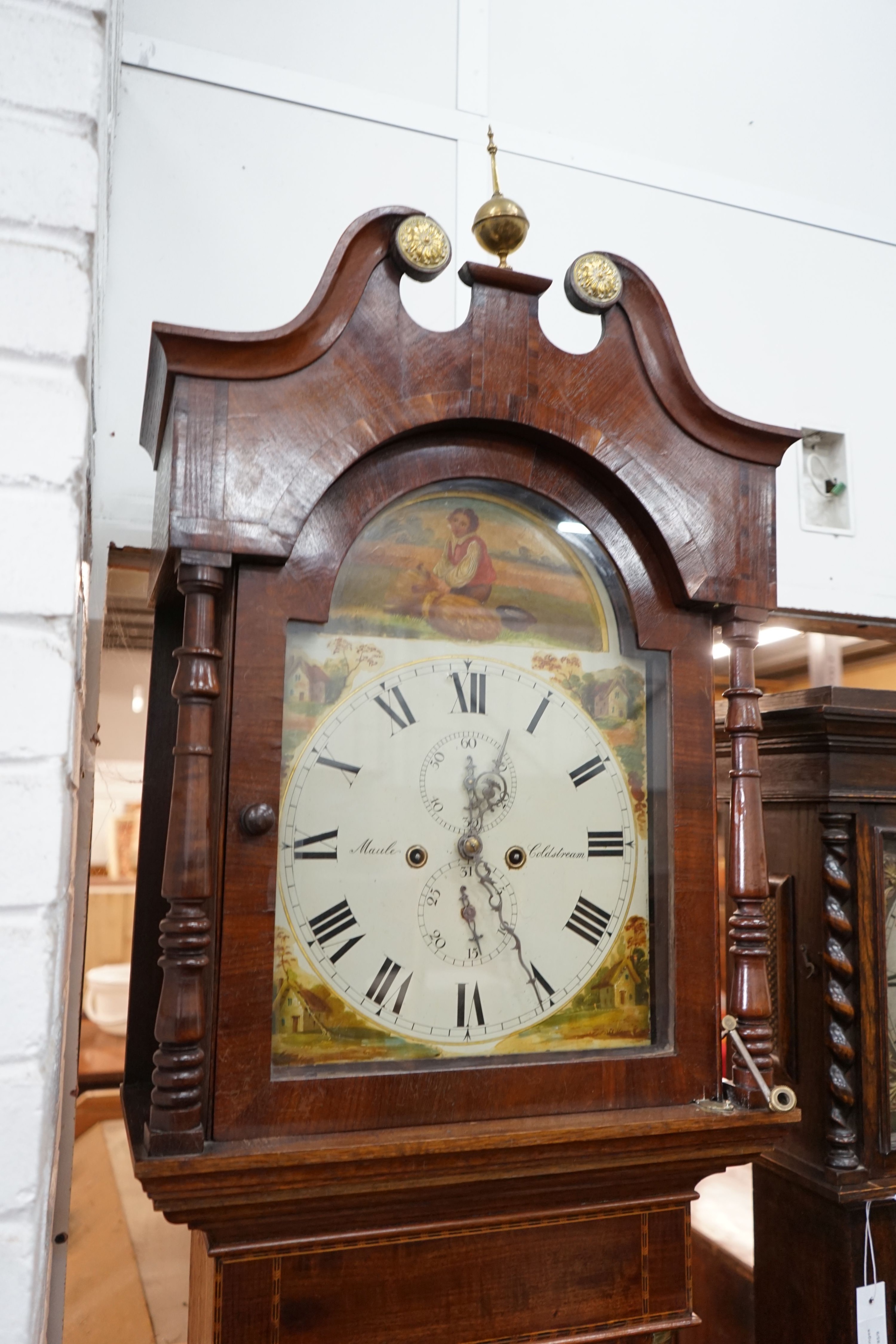 An early 19th century mahogany banded oak 8 day longcase clock, the painted dial marked Maule, Coldstream, height 232cm